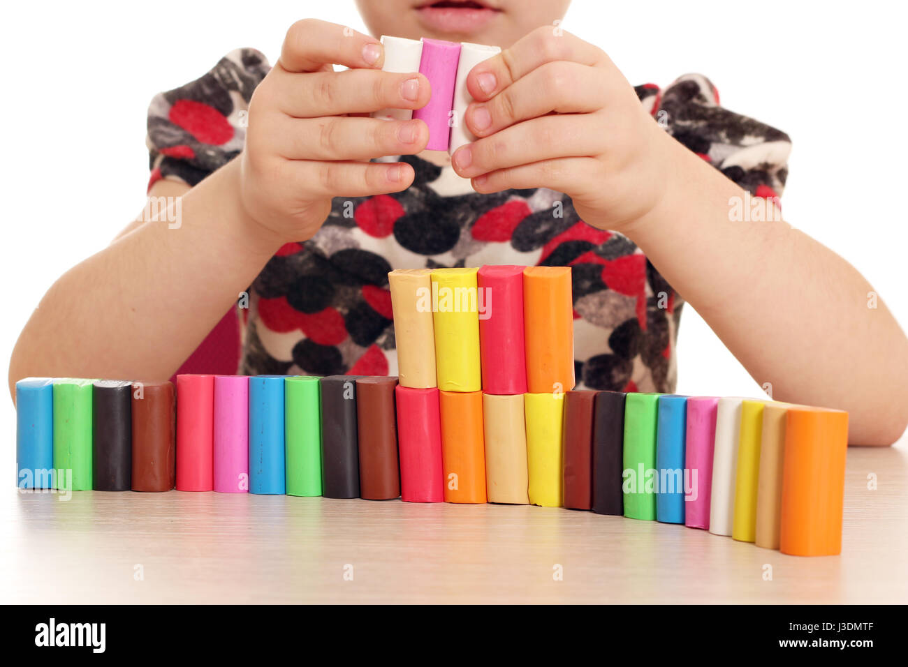 child fun and play with plasticine Stock Photo - Alamy