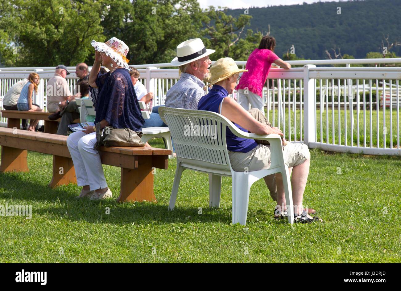 Seniors at the gallop racecourse Stock Photo