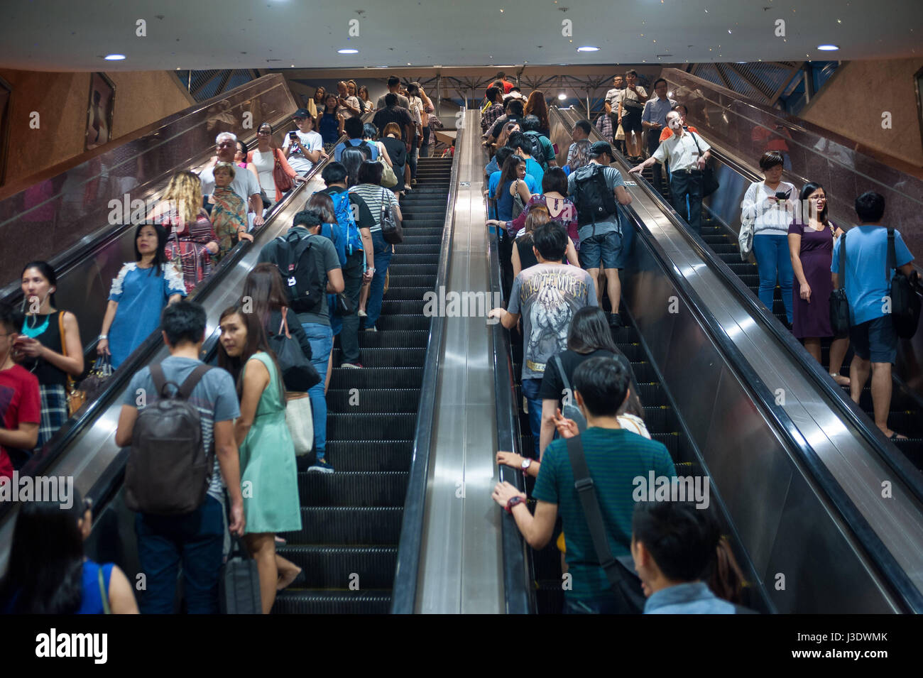 Singapore, Republic of Singapore, 2016, Escalators at the Raffles City Shopping Mall Stock Photo