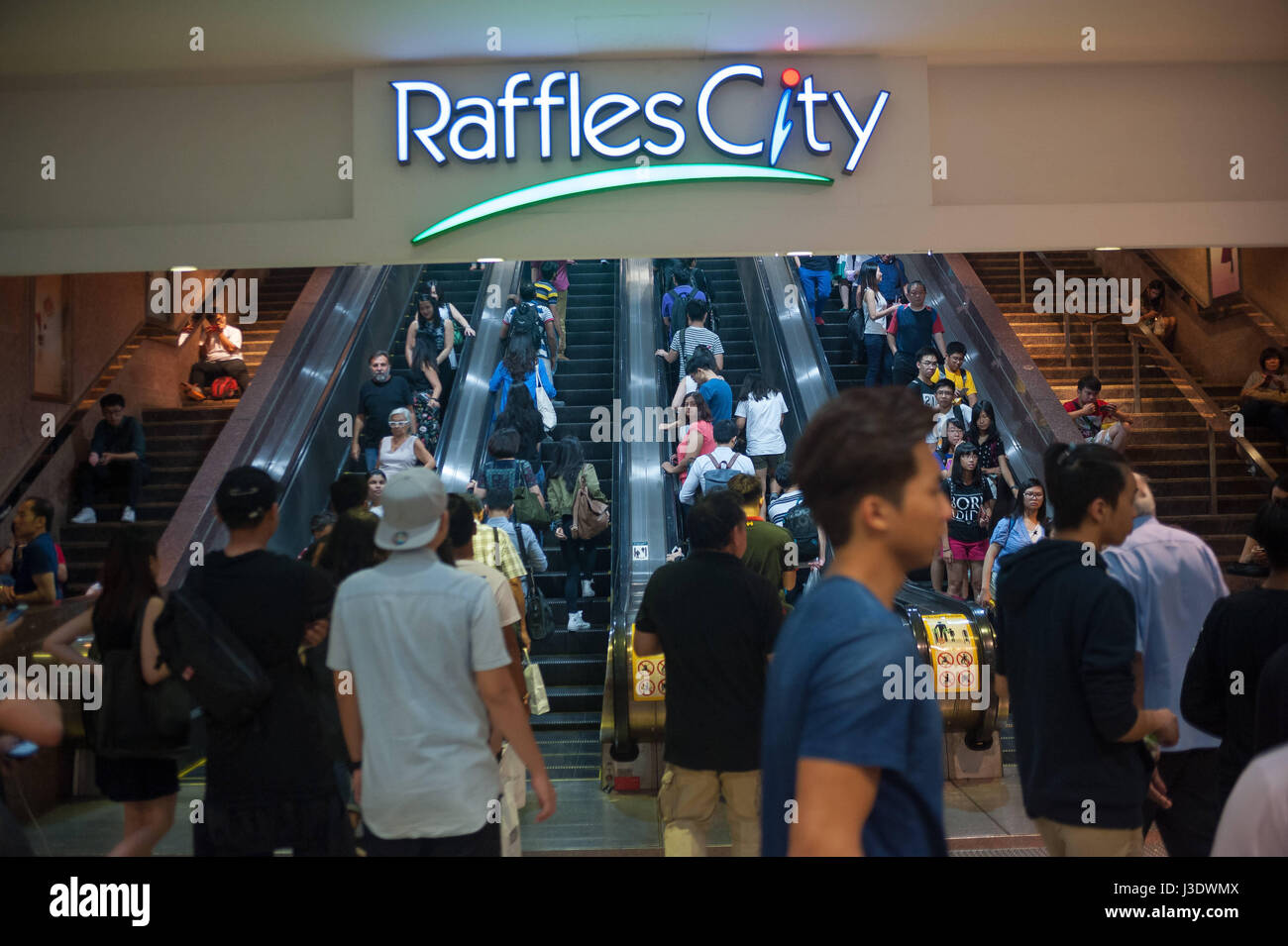 Singapore, Republic of Singapore, 2016, Escalators at the Raffles City Shopping Mall Stock Photo