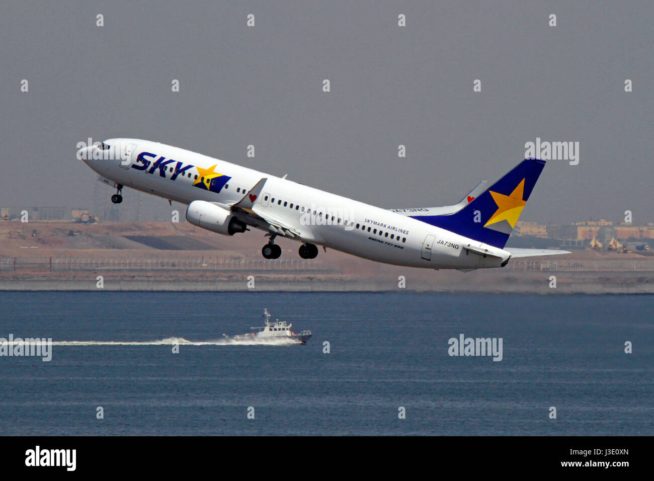 Skymark Airlines Boeing 737 Taking off Haneda Airport Tokyo Japan Stock