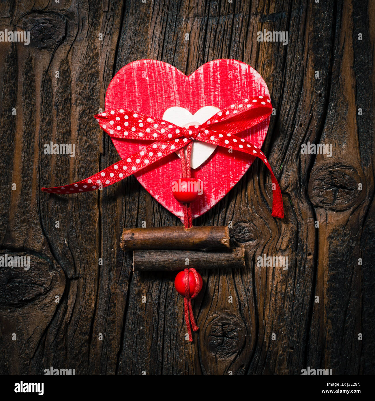 Red heart on an old wooden background Stock Photo - Alamy