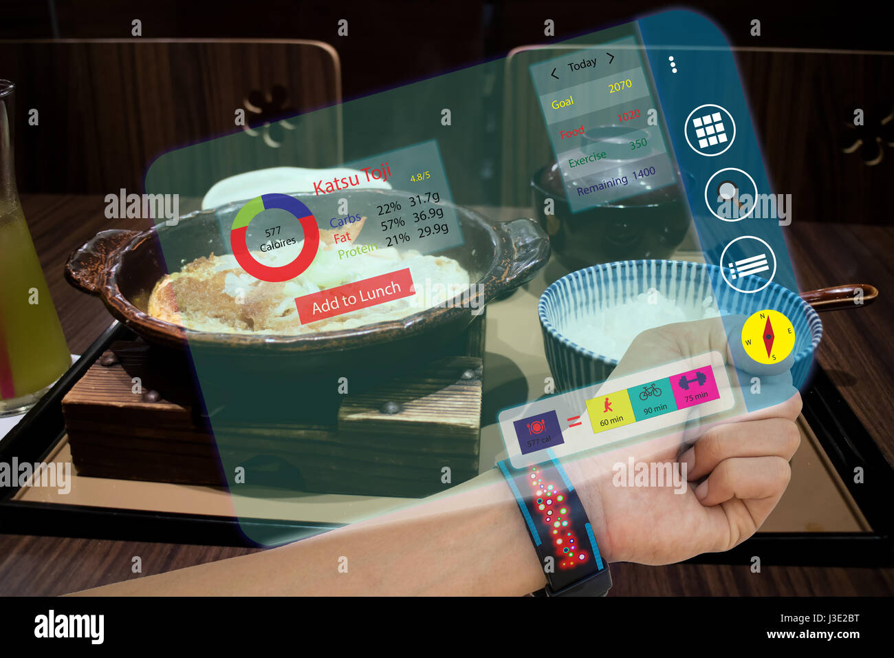 iot,internet of things, smart watch concepts,man use augmented reality to calculate food intake and calories while have a food,the data compare the me Stock Photo