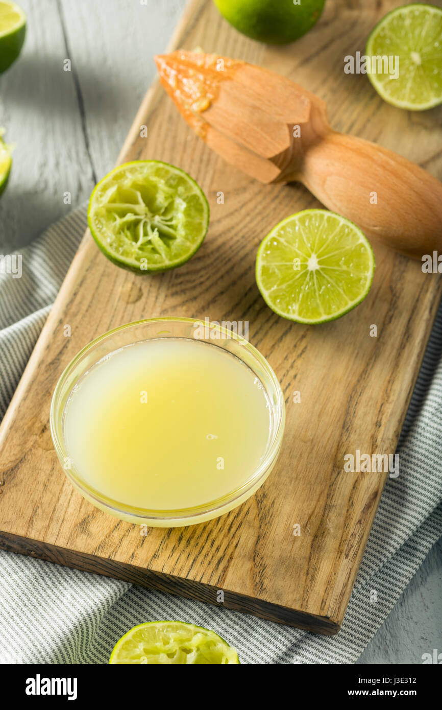 Raw Organic Yellow Lime Juice in a Bowl Stock Photo - Alamy