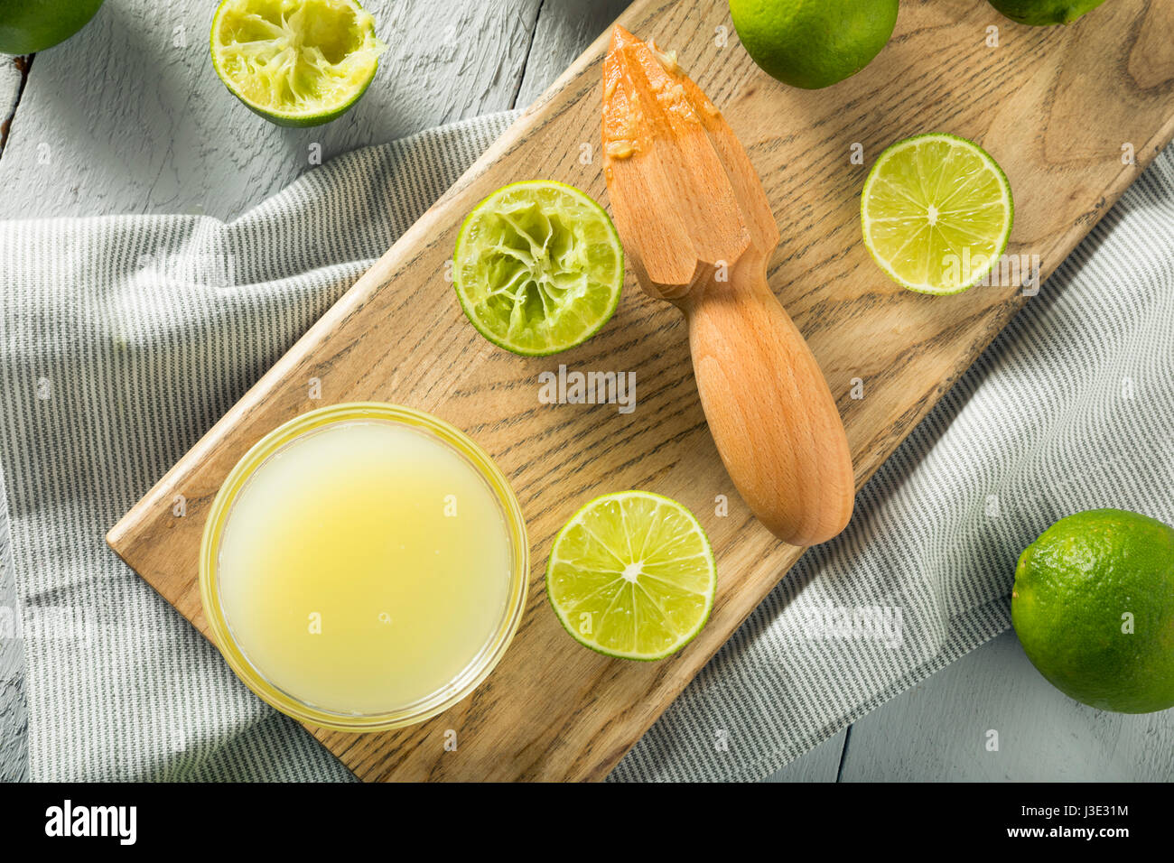 Raw Organic Yellow Lime Juice in a Bowl Stock Photo - Alamy