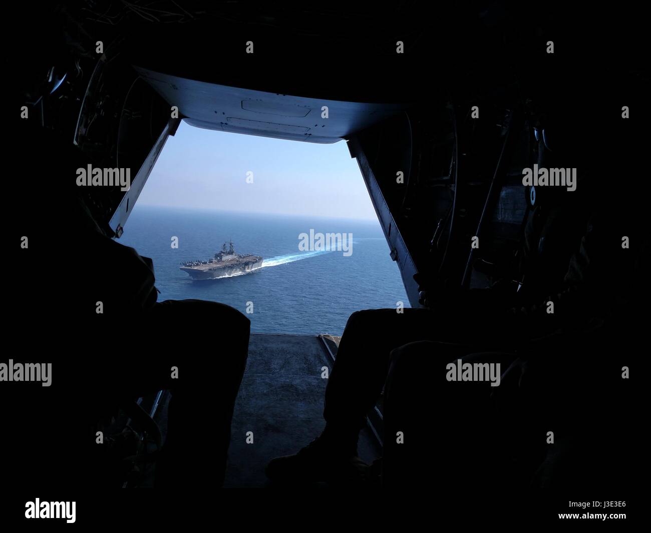 The USN Wasp-class amphibious assault ship USS Bataan steams underway as seen from the back of a USMC MV-22B Osprey assault support aircraft March 23, 2017 in the Mediterranean Sea.    (photo by Sherrie Flippin /US Navy  via Planetpix) Stock Photo