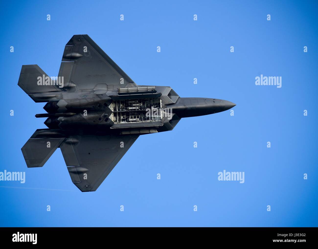 The USAF F-22 Raptor stealth tactical fighter aircraft does a fly-by during the Atlantic Trident World War I Remembrance Day at Joint Base Langley-Eustis April 21, 2017 near Hampton, Virginia.     (photo by Areca T. Bell /US Air Force  via Planetpix) Stock Photo