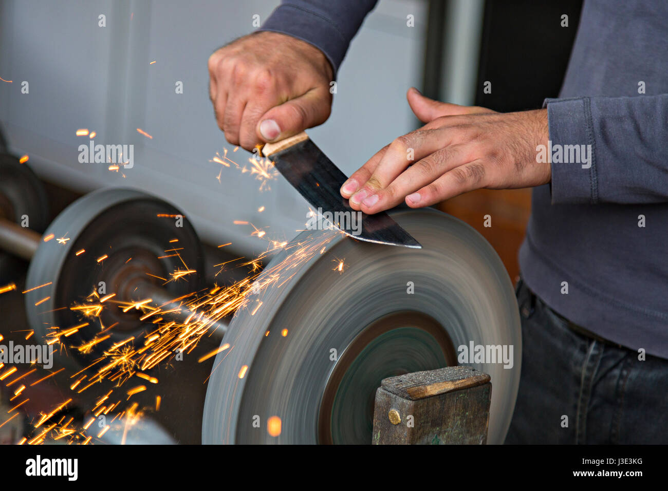 Sharpening the knife. Stock Photo