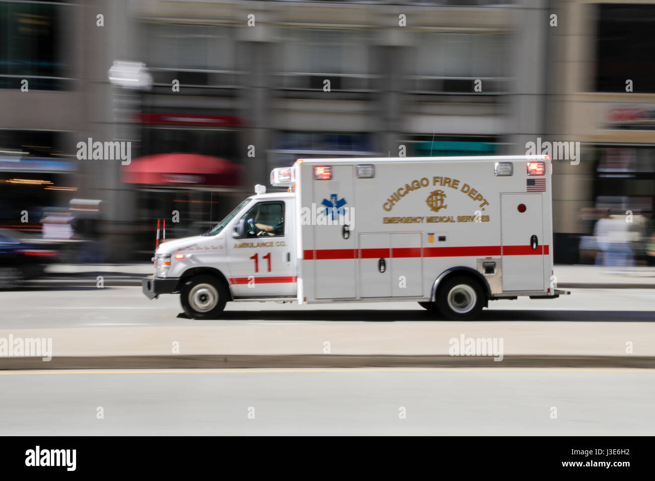 Chicago Fire Department ambulance on emergency call. Blured. Stock Photo