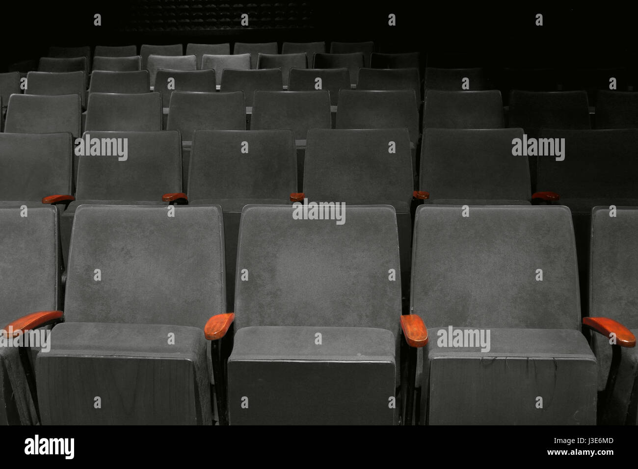 vintage seat in movie theater empty auditorium, black and white tone ...