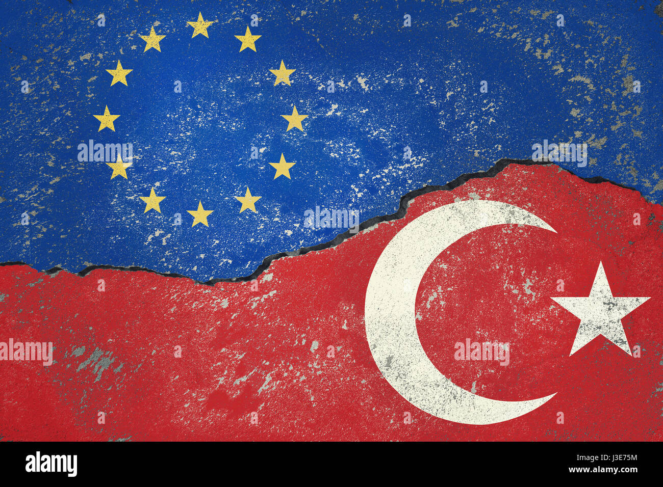 Turkish Flag and European Union Flag painted on old cracked wall Stock Photo