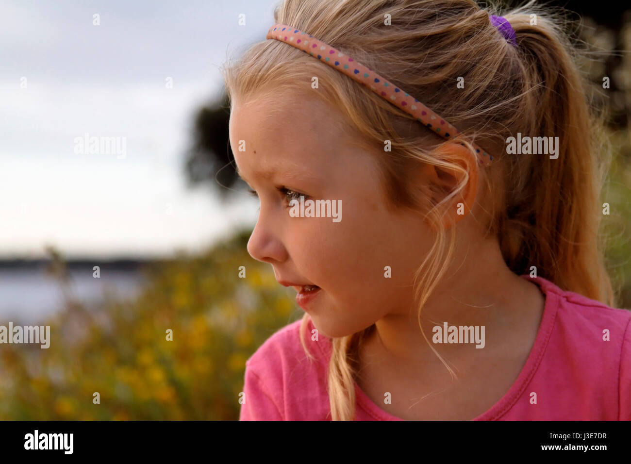 Portrait of a girl at sunset Stock Photo - Alamy