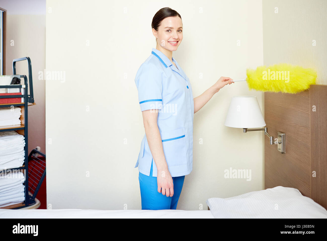 Happy hotel maid Stock Photo