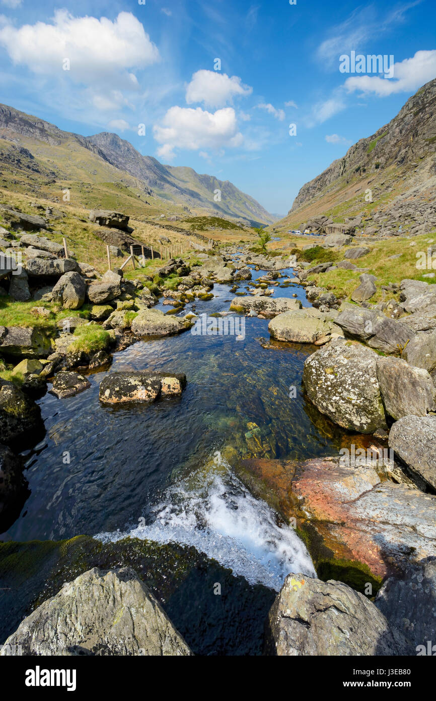 Afon Nant Peris, the river running through the rugged and scenic Llanberis Pass in Snowdonia,  Gwynedd, North Wales. A popular area in the Snowdonia N Stock Photo