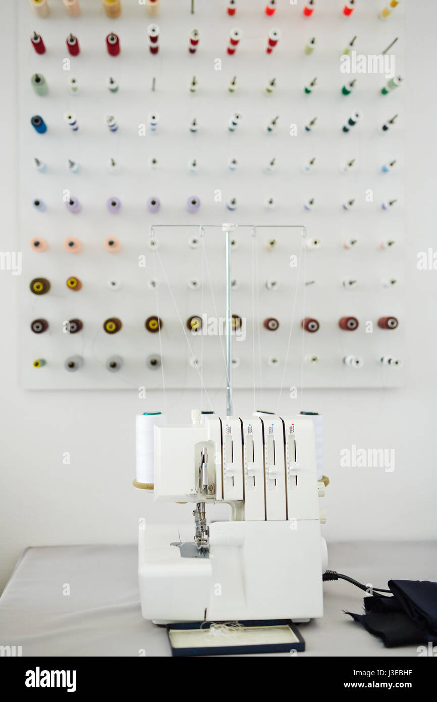 Serger Machine in Tailoring Shop Stock Photo