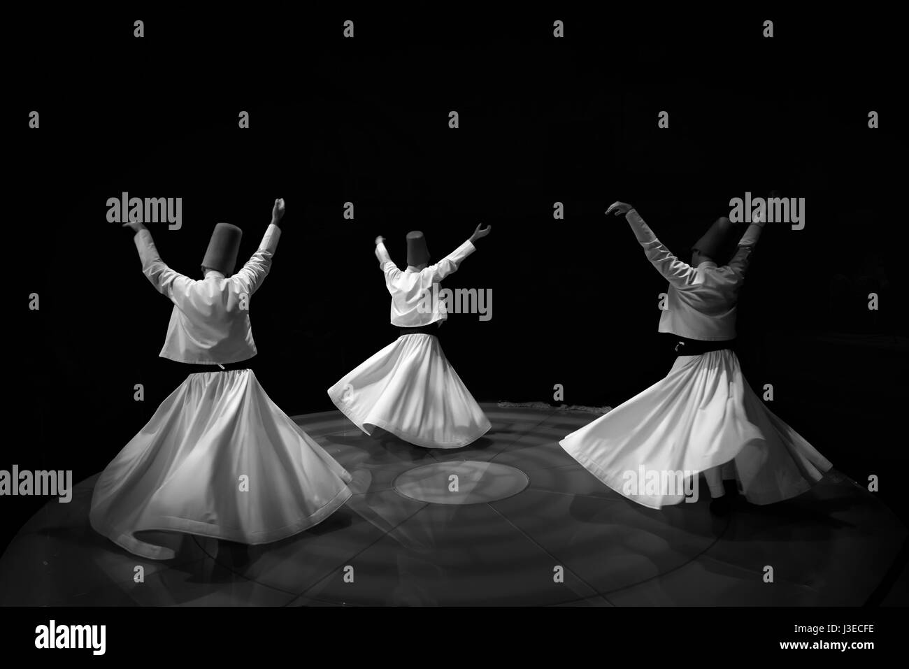 Black and White Dervishes twirling Stock Photo