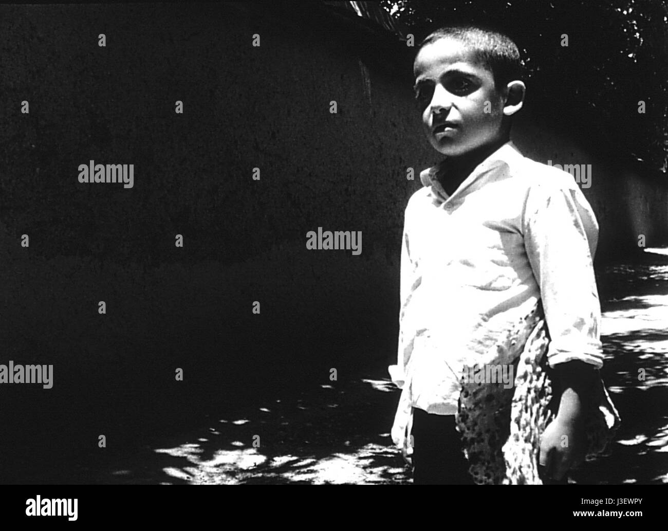 Nan va Koutcheh The Bread and Alley Year : 1970 Iran Director : Abbas Kiarostami short Stock Photo