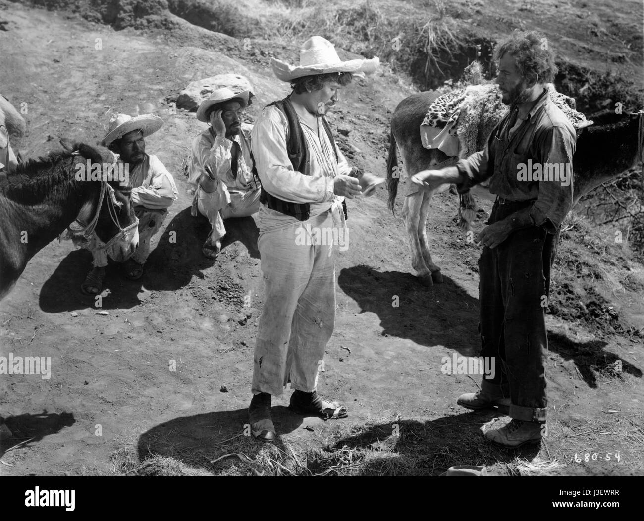 The Treasure of the Sierra Madre Year : 1948 Directed by John Huston Alfonso Bedoya, Humphrey Bogart Stock Photo