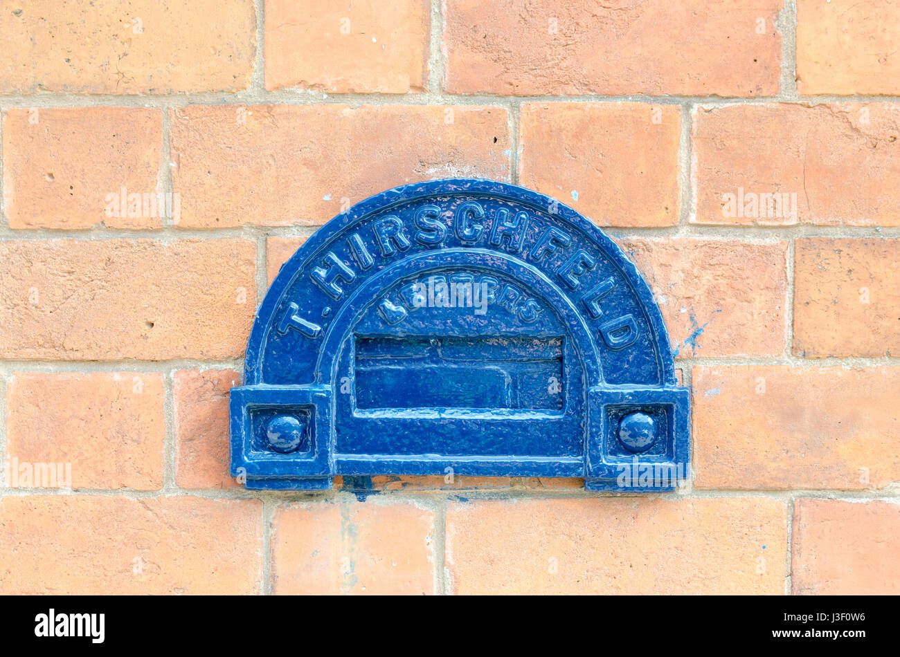 Small old fashioned wall mounted letter box in the Jewellery Quarter in
