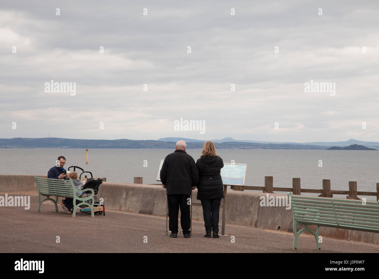 People walking on Portobello beach in capital of Scotland, Edinburgh