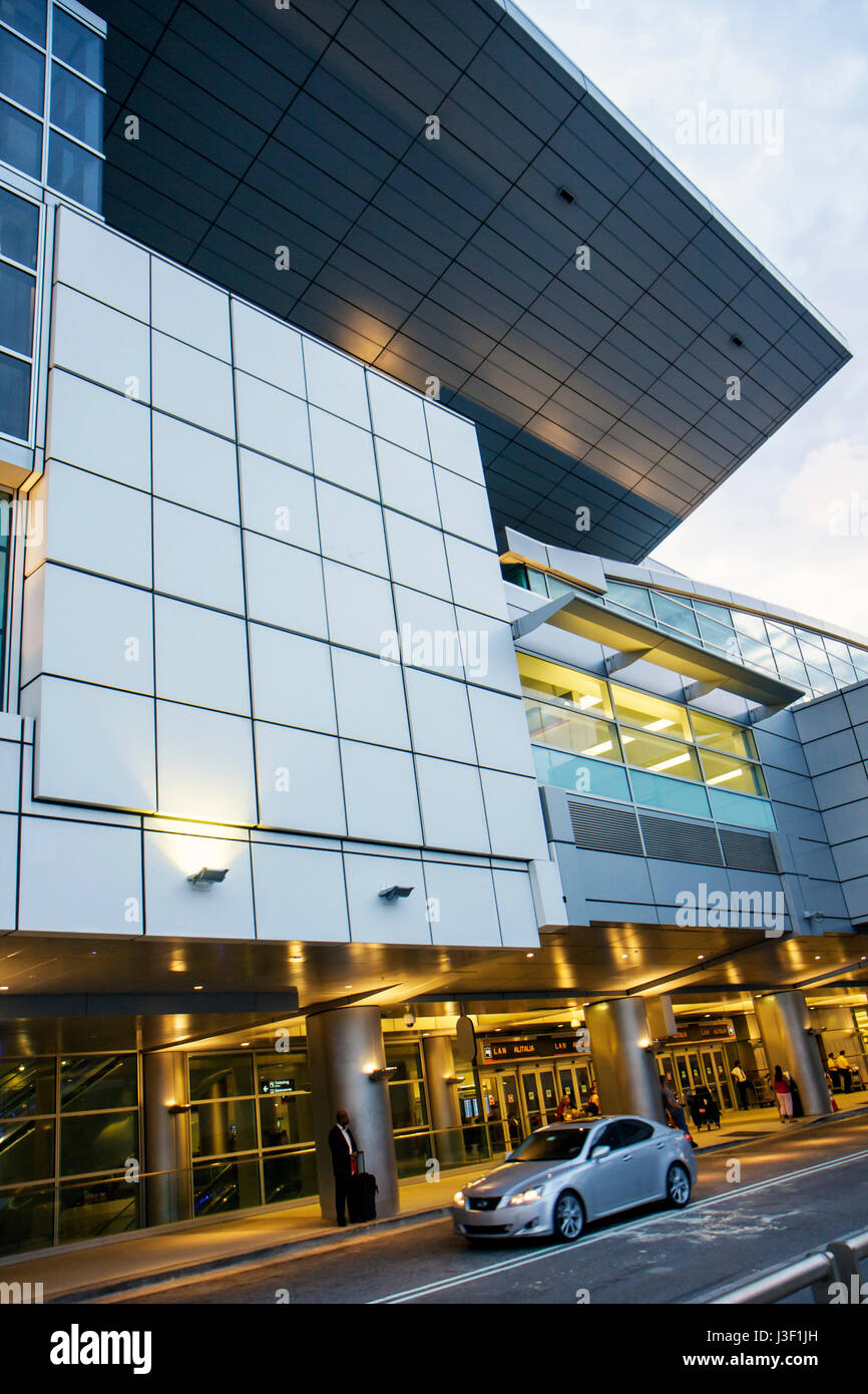 Miami Florida International Airport MIA,J,terminal,outside exterior front,entrance,design,architecture,architectural,cars,drop off passenger passenger Stock Photo