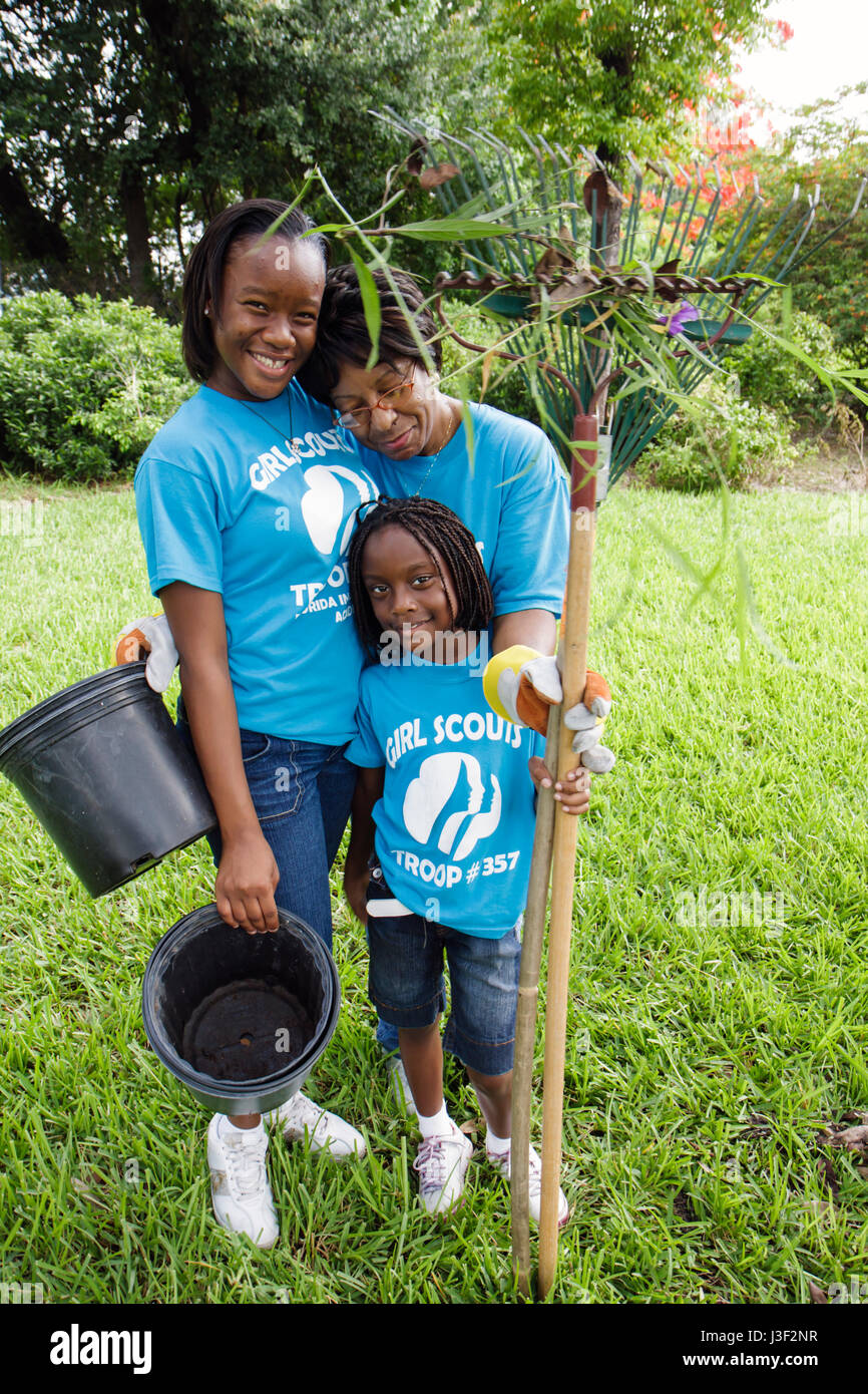 Miami Florida,Little Haiti,Neighborhoods in Bloom Butterfly Garden,volunteer volunteers community service volunteering work worker workers,teamwork wo Stock Photo