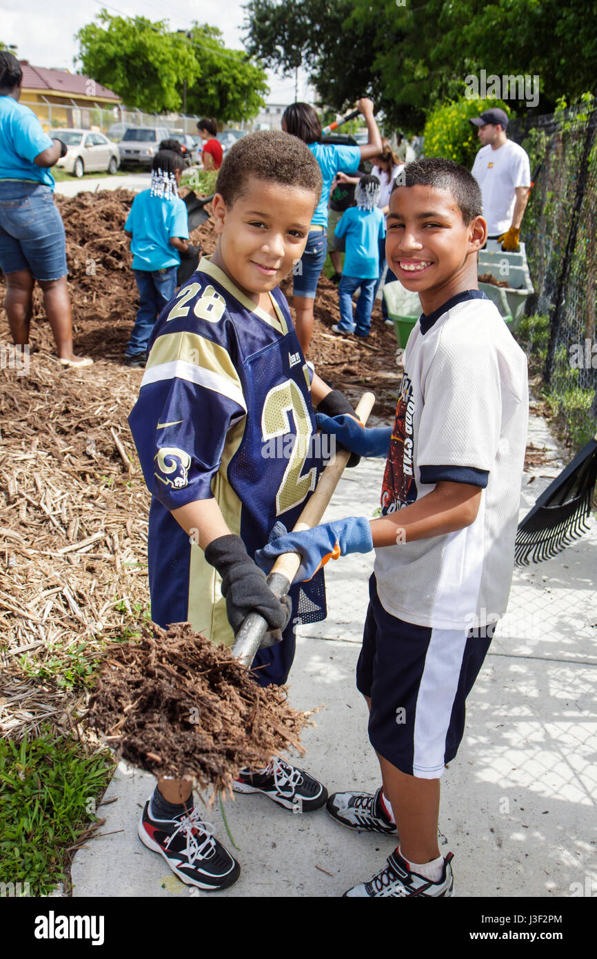 Miami Florida,Little Haiti,Neighborhoods in Bloom Butterfly Garden,volunteer volunteers community service volunteering work worker workers,teamwork wo Stock Photo