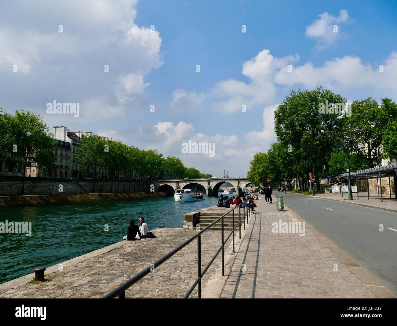 View along the Seine, including bridge, from the Right Bank, Rives de Seine. Paris, France. Former Georges-Pompidou Express way. Stock Photo