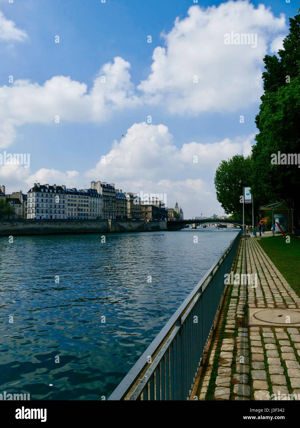 View down the Seine from the Right Bank park, Rives de Seine. Paris, France Stock Photo