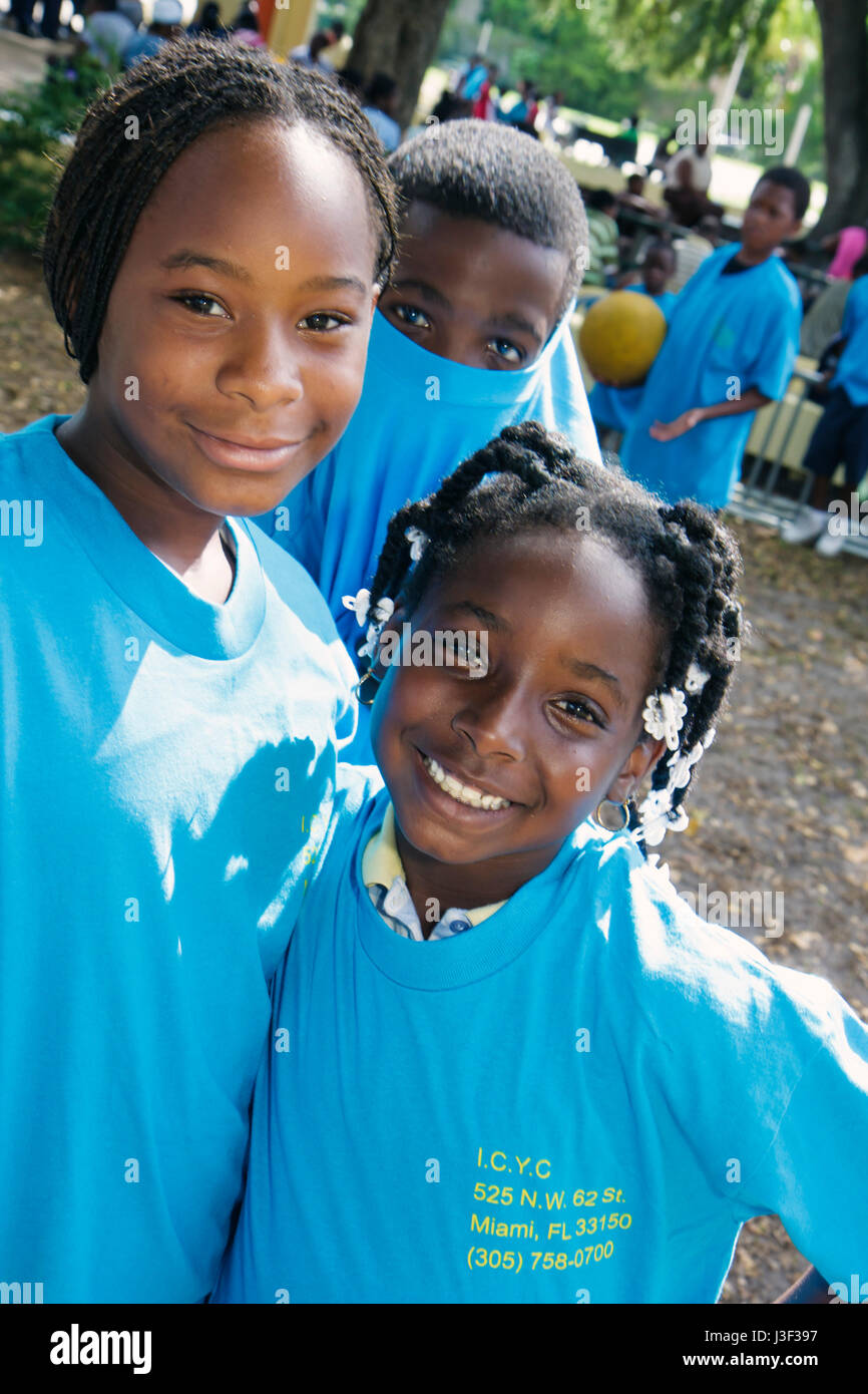Miami Florida,Little Haiti,Range Park,Back to School Black girl girls,youngster,female kids children friends Inner City Youth Center,centre,ICYC,urban Stock Photo