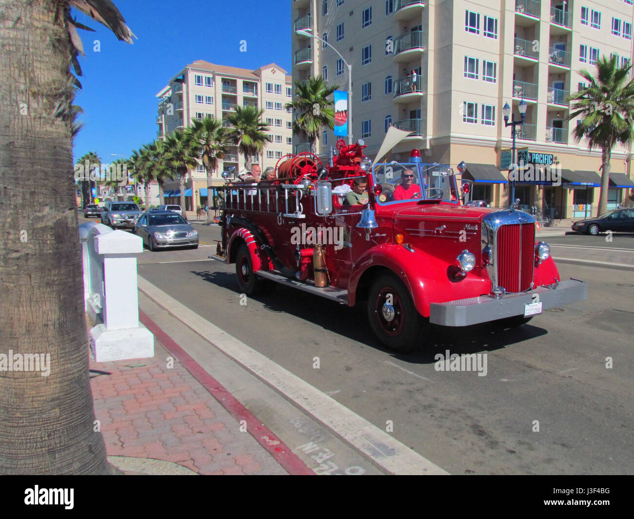 Old fire truck cruising at Oceanside, Califfornia Stock Photo