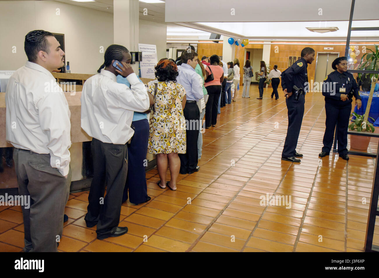 Miami Florida,Miami Police Department,Police Recruitment Open house houses home homes residence,multicultural,Black Blacks African Africans,Hispanic L Stock Photo
