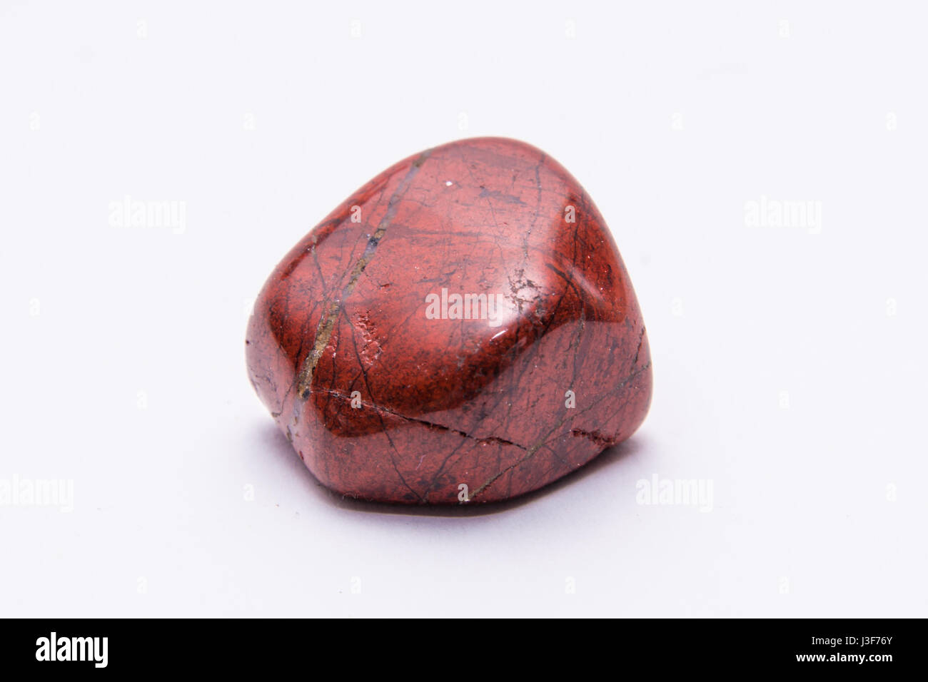 Red striped gemstone gem jewel mineral precious shiny Stock Photo - Alamy