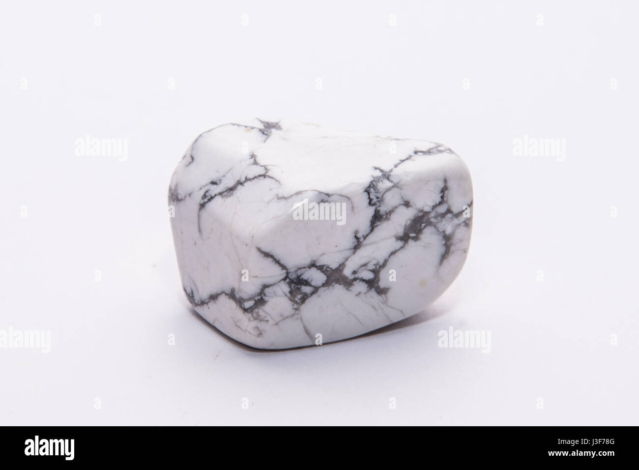 White black striped gemstone gem jewel mineral precious shiny Stock