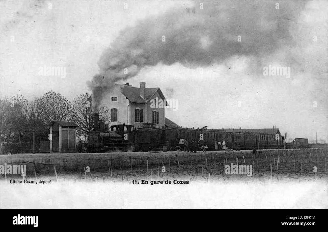 This photograph or document captures the Gare de Cozes, a train station in France around the year 1900. It highlights the architecture and transport history of the area during the turn of the century. Stock Photo