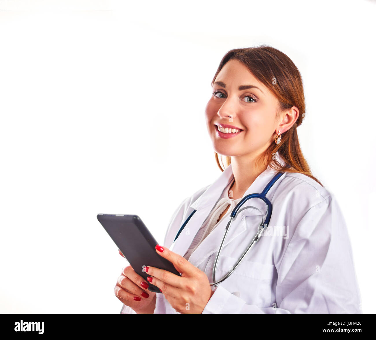 Cheerful female doctor with gadget Stock Photo
