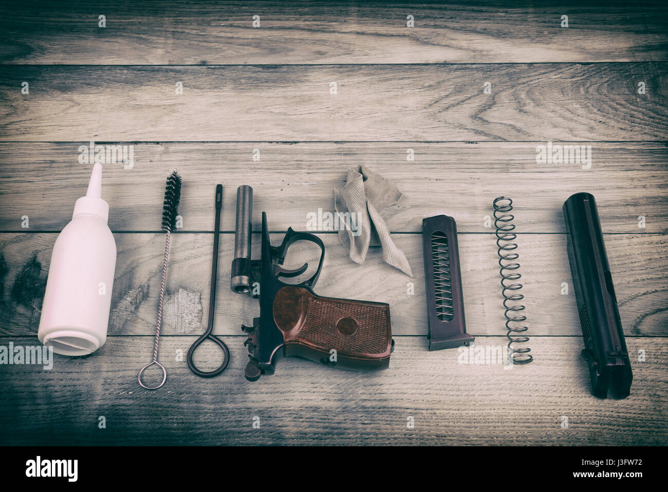 Separate parts of Makarov pistol and cleaning kit Stock Photo - Alamy