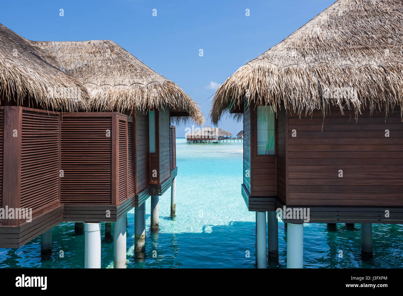 Tropical Island Paradise Over Looking Over Water Bungalows With