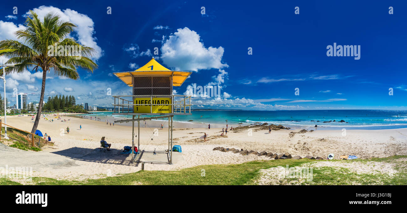 COOLANGATTA, AUS - MAY 01 2017, Snappers rock and Rainbow Bay beach with lifeguard tower, Gold Coast, Queensland, Australia Stock Photo