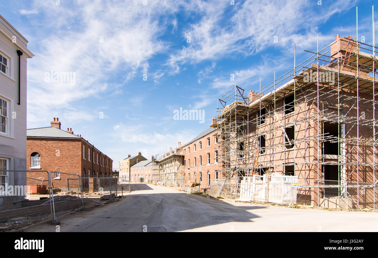 Dorchester, England, UK - May 7, 2016 - Streets of new houses under construction in Poundbury, Prince Charles's new town under construction in Dorset. Stock Photo