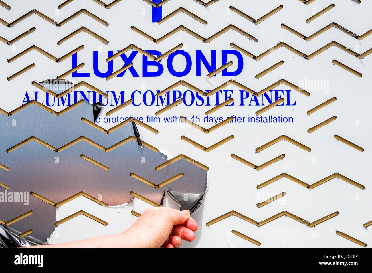 Plastic film covering Luxbond a aluminium composite panel Stock Photo