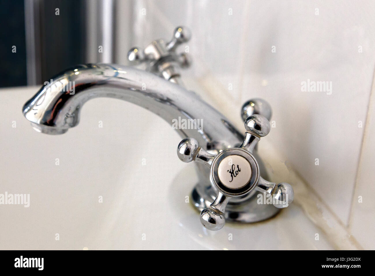 Modern shower room sink (wash basin) with hot tap (faucet) Stock Photo