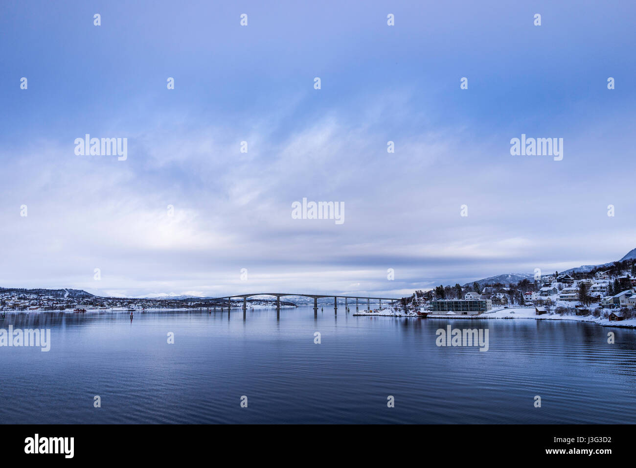 Gisund Bridge joins Senja Island to the Norwegian mainland at Finnsnes, Troms County, Norway. Stock Photo