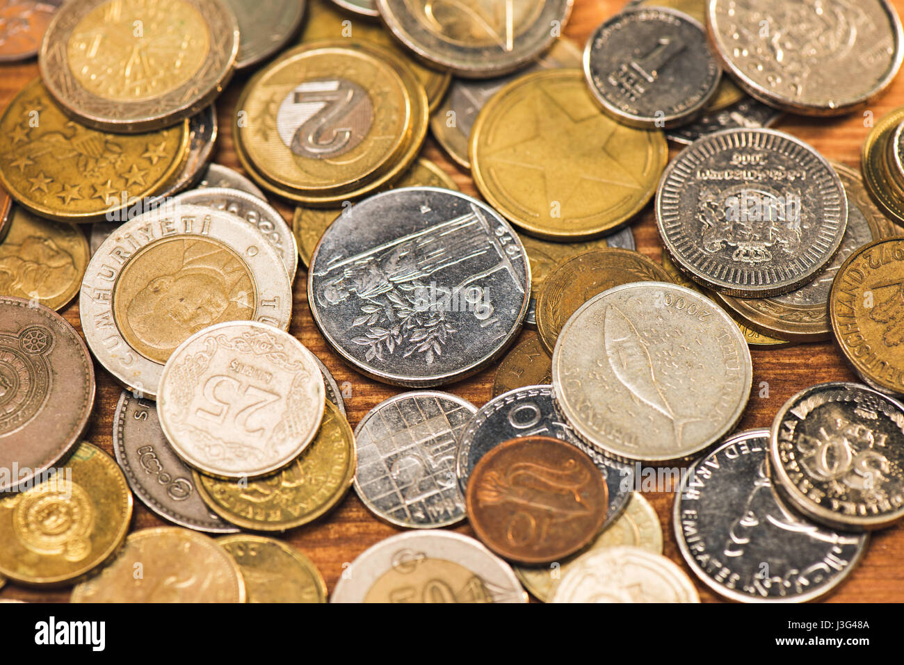 top view and close up of different coins background Stock Photo - Alamy