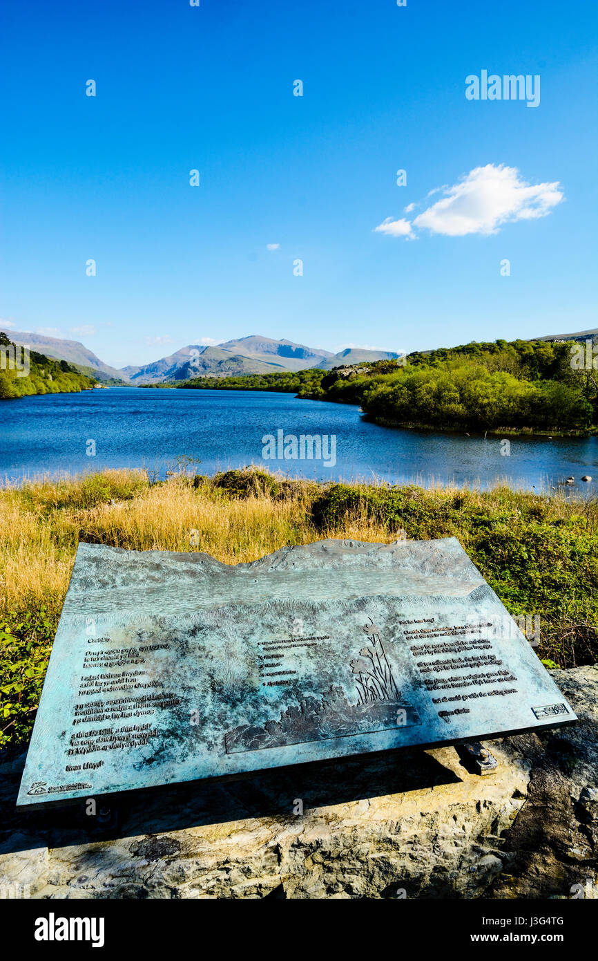 Snowdon and Llyn Padarn from Penllyn (Head of the Lake) in the Snowdonia National Park in Gwynedd, North Wales.  The wooded area (left) is Fach Wen. T Stock Photo