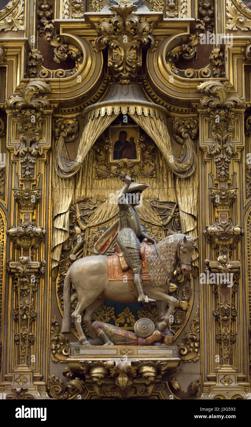 Equestrian statue of Saint James the Great by Spanish Baroque sculptor Alonso de Mena on the Retablo de Santiago Matamoros (Altar of St James the Moorslayer) in the Granada Cathedral (Catedral de Granada) in Granada, Andalusia, Spain. Stock Photo