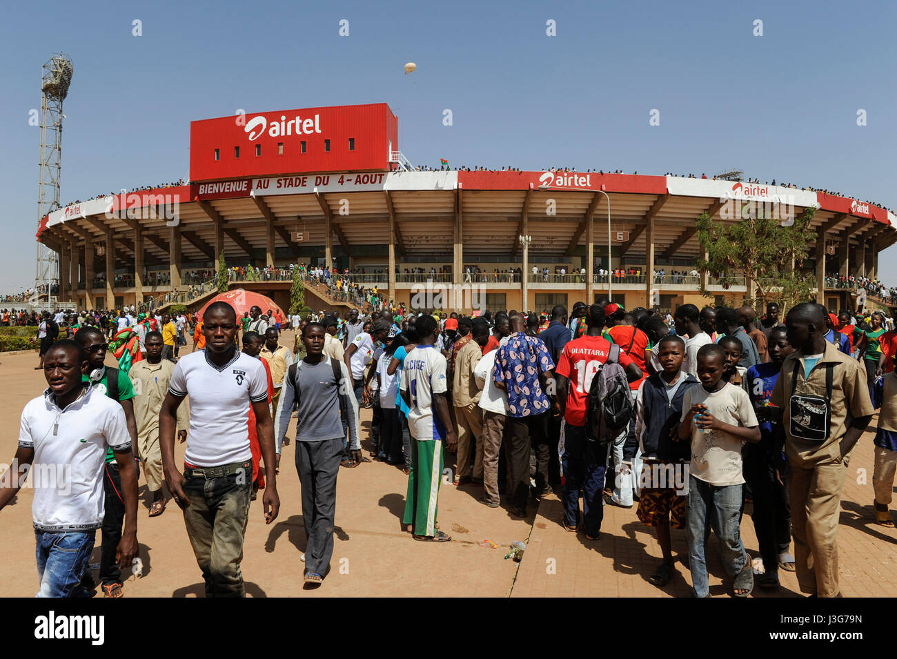 BURKINA FASO, capital Ouagadougou, reception of the national football team of Burkina Faso as 2nd winner of the Africa Cup 2013 in Stadium in Ougadougou, sponsoring and advertisement by mobile phone company Airtel Stock Photo