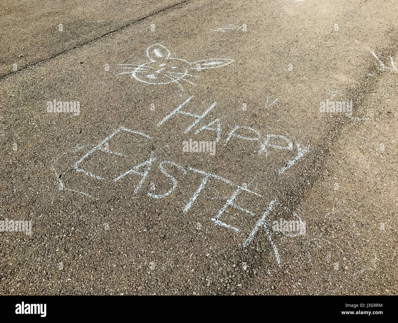 Easter graffiti on sidewalk. Stock Photo