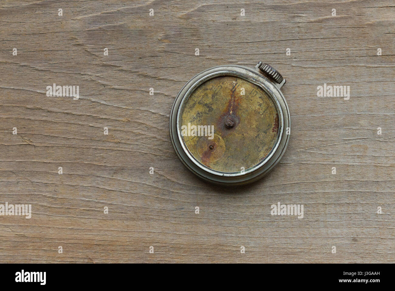 A broken antique pocket watch Stock Photo Alamy