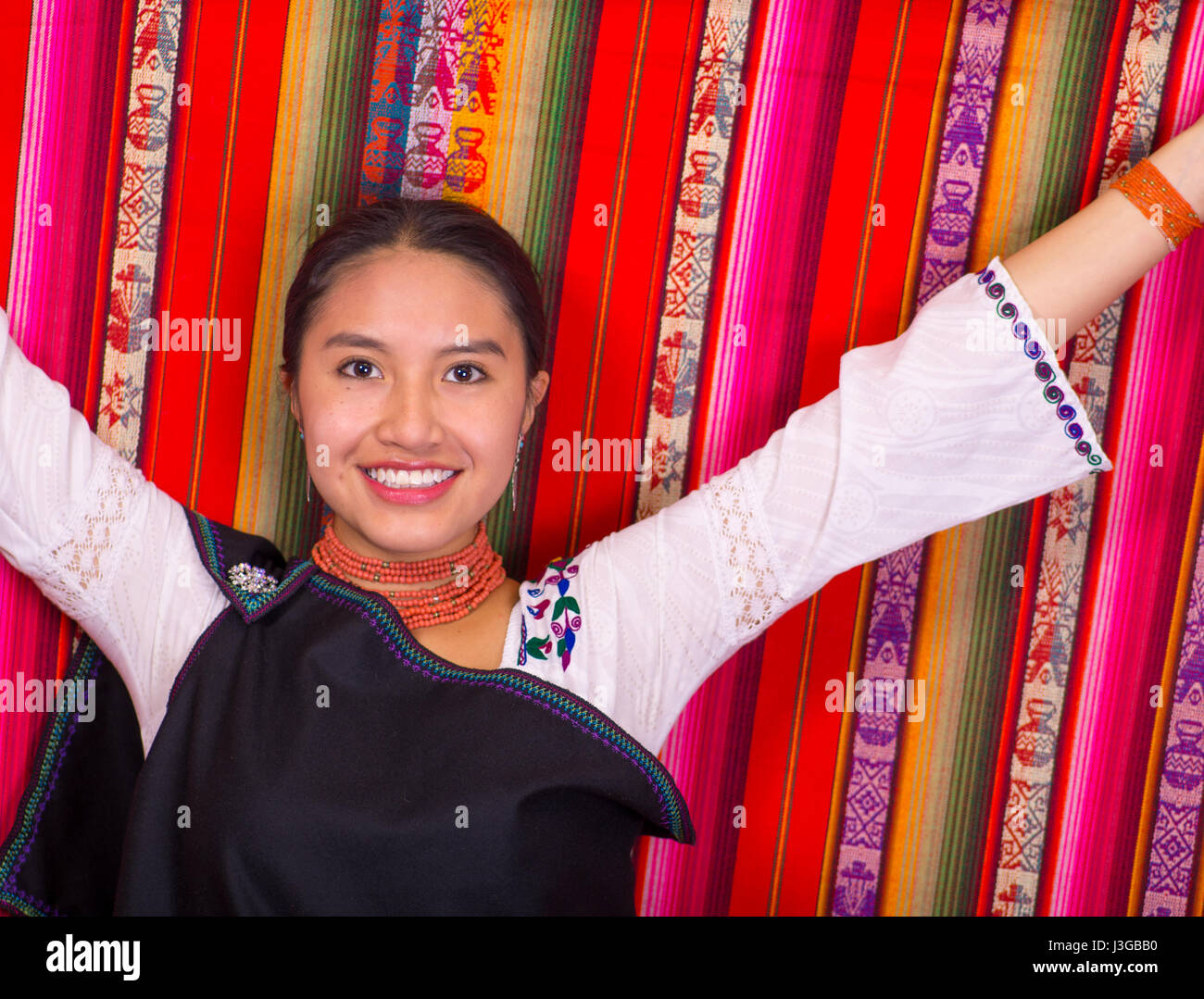 Beautiful Hispanic Model Wearing Andean Traditional Clothing Smiling